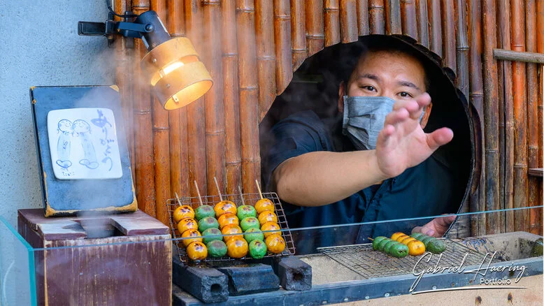 Locals interacting at a market stall